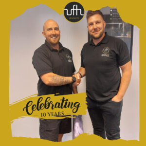 Liam Cullen (Left) receiving his 10 year reward by Craig Davis (R) Contracts Manager.